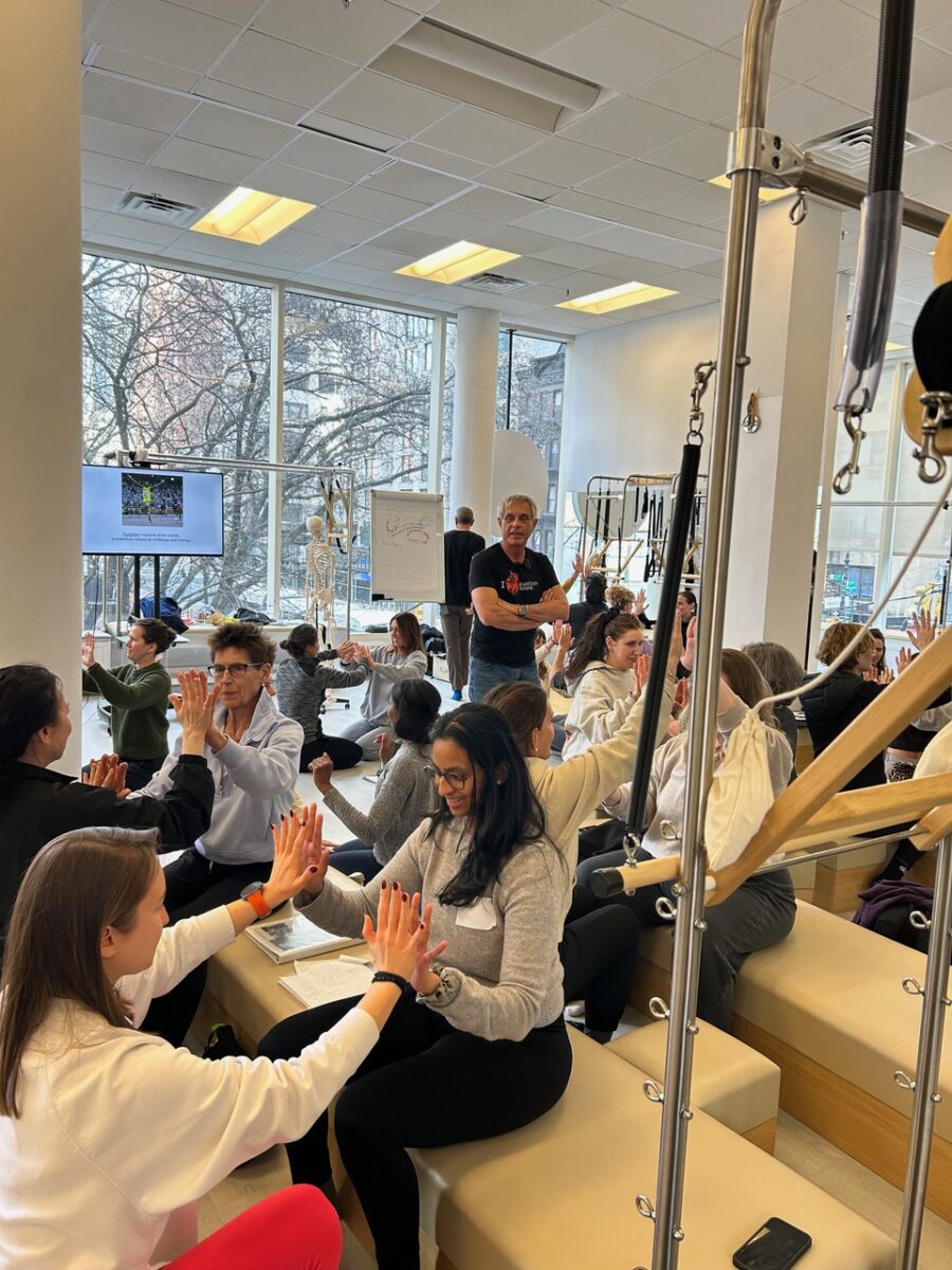 Tom Myers with class of students