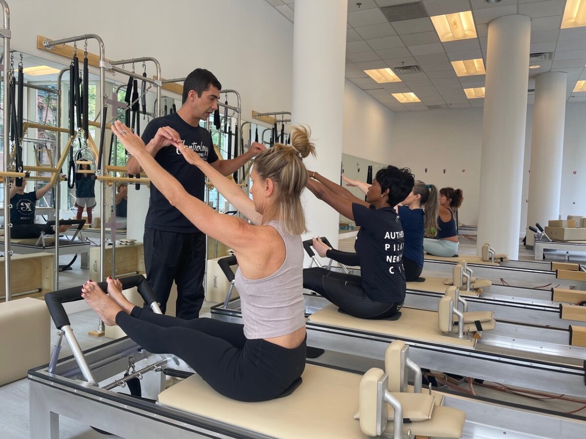 Frederico(Kiko) Figueiredo demonstrating authentic pilates with students